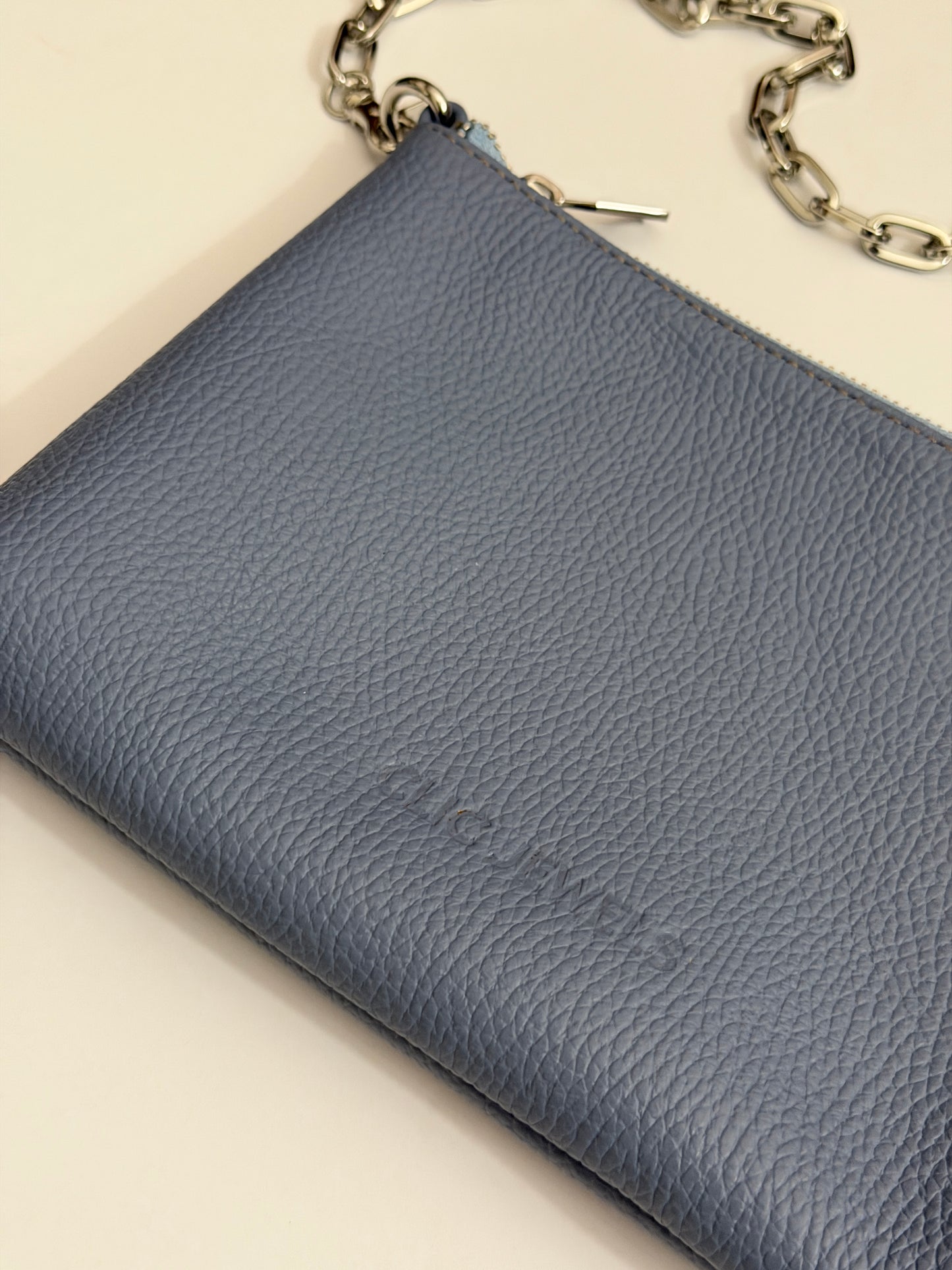 ZIPPER CLUTCH (baby blue dolaro genuine leather)