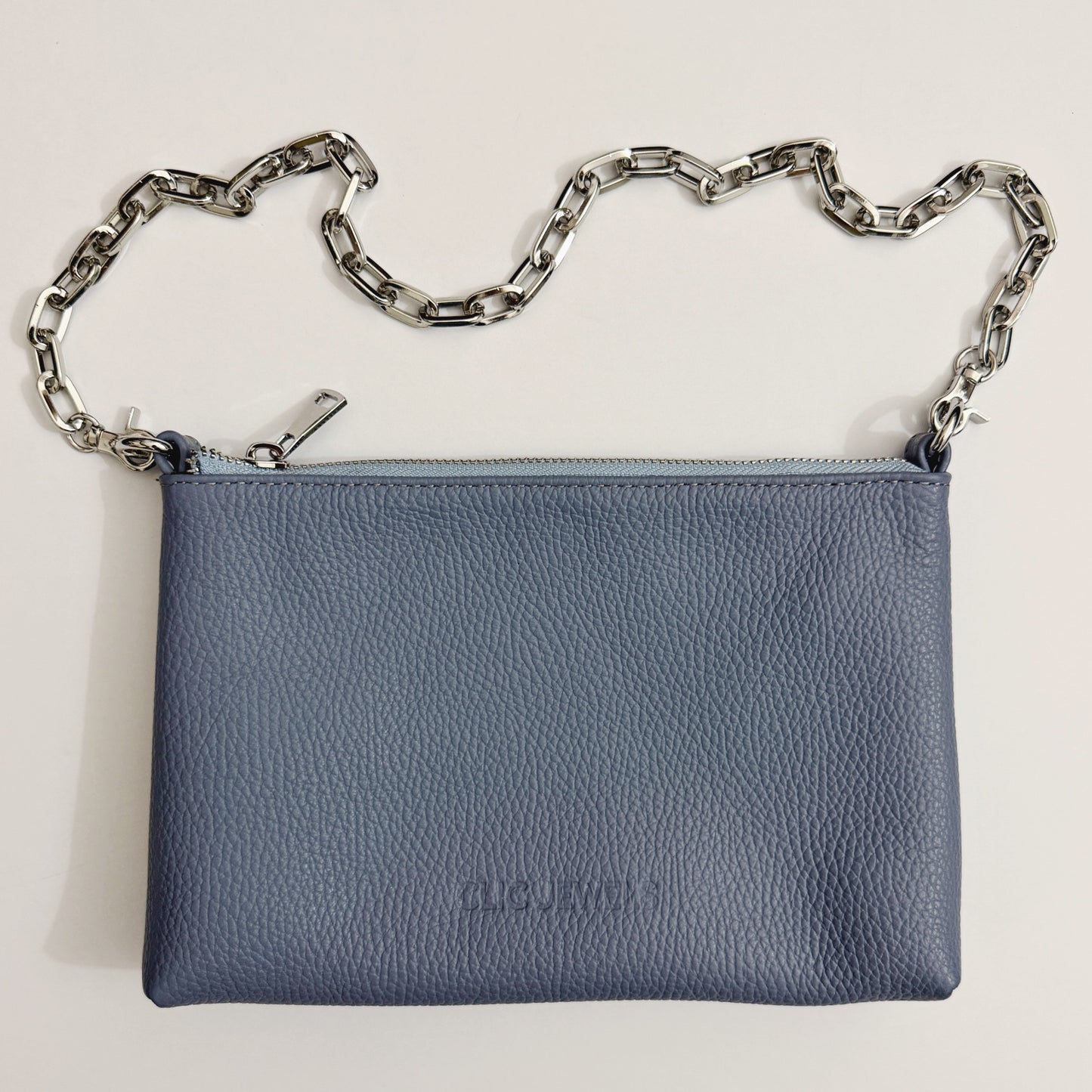 ZIPPER CLUTCH (baby blue dolaro genuine leather)
