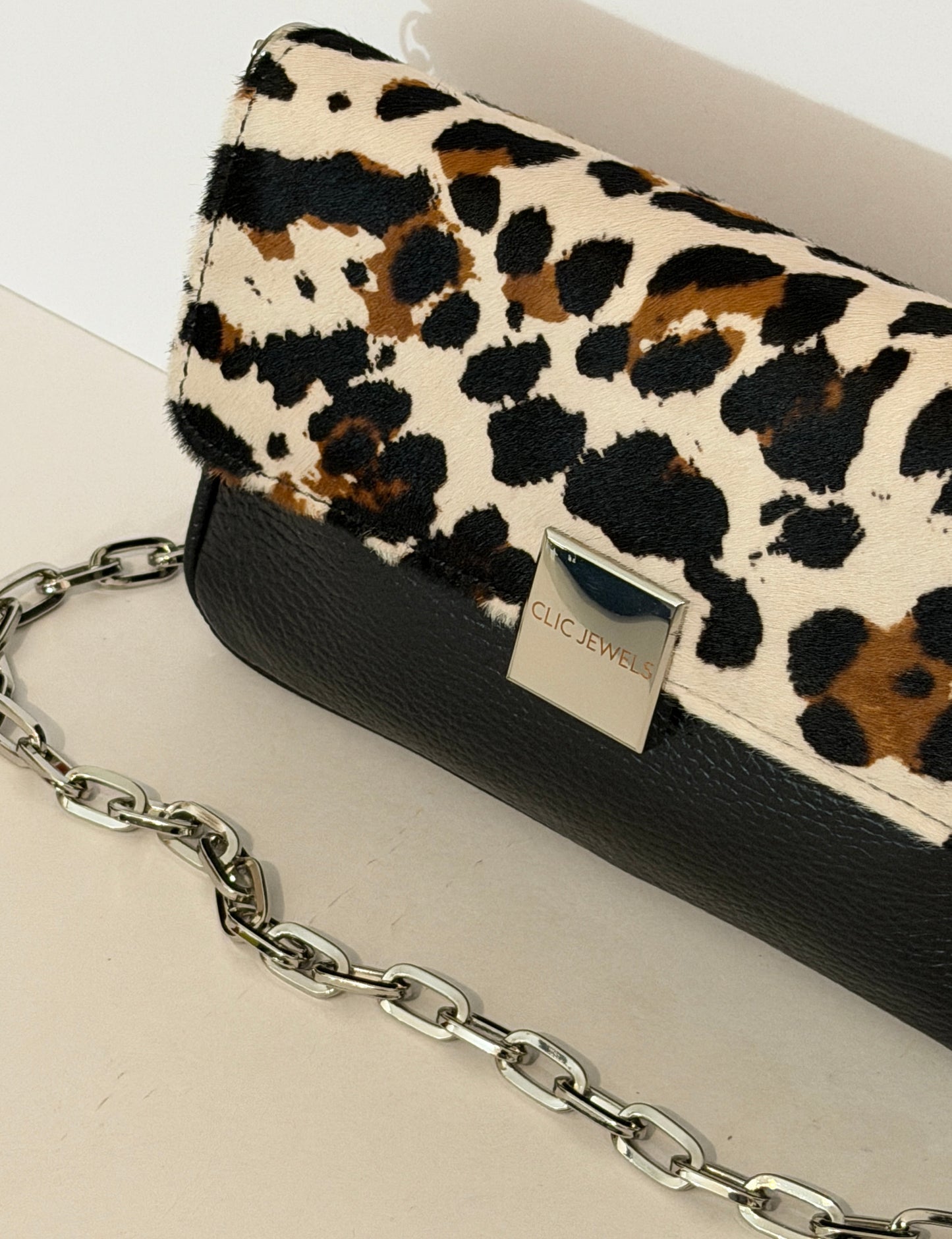 NEIRA MINI (animal print ponyskin/black dolaro genuine leather)
